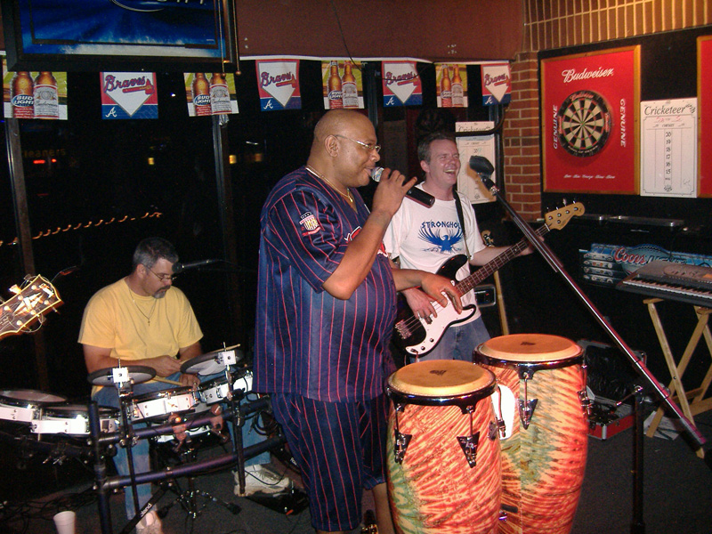 Wayne Dubose Huggy Bear and John rocking out with Seven 7 on July 4, 2008